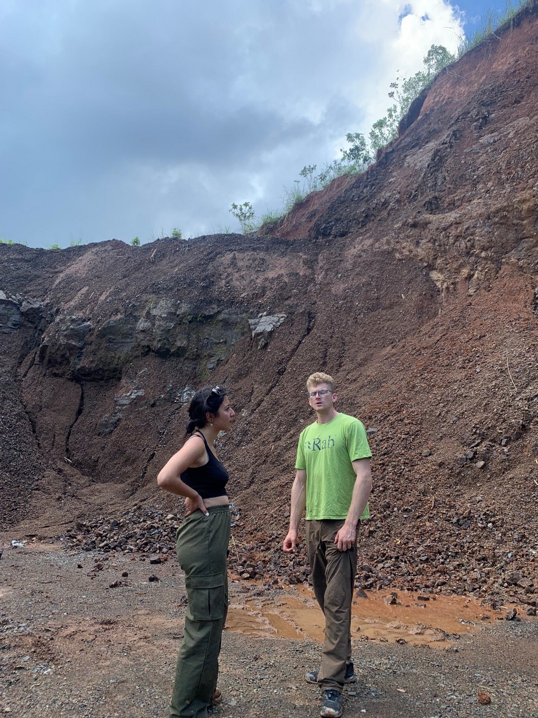 Mirna Kassem and Drew Gomberg looking at a failure next to the roadway